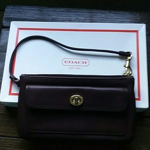 New in box Authentic brown coach wristlet